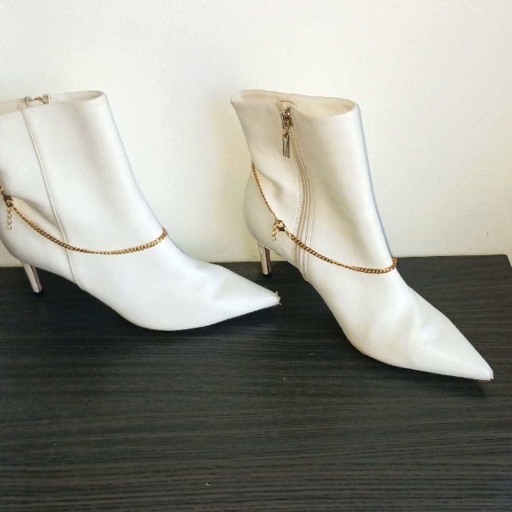 Schutz White Heeled Booties with gold ankle bracelet